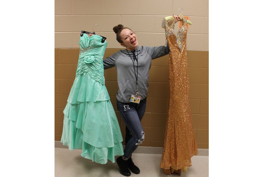 With more than 100 dresses to choose from, Aaliyah poses with a couple of her favorites.