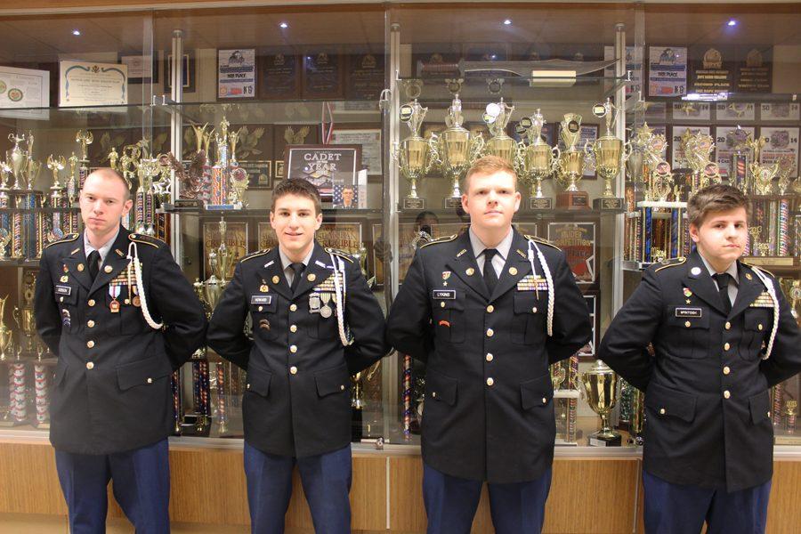 Seniors Cody Gibson, Austin Howard, Austin Lykins, and Chris Mcintosh in uniform.