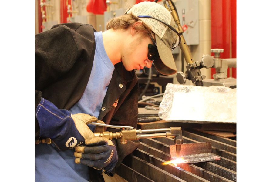 Chase Gabbard applies his skills in Welding class.