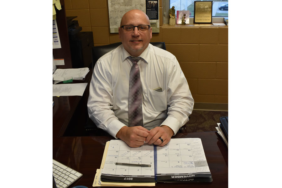 As assistant principal and athletic director, Mr. Keene juggles many different responsibilities. 
