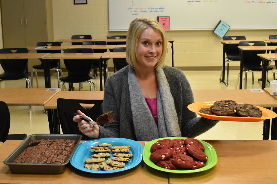 Mrs. Doyle poses with her scrumptious treats.
