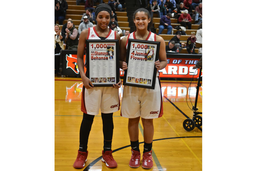 Behanan and Flowers pose with their prestigious awards.