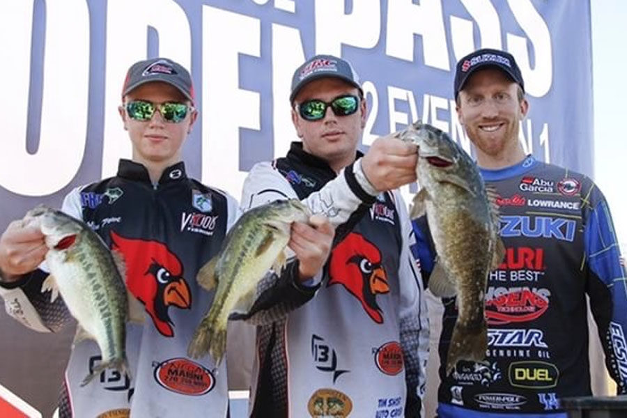 Allen+and+Robert+Powe+pose+with+their+catches+with+tourney+host+Brandon+Card.