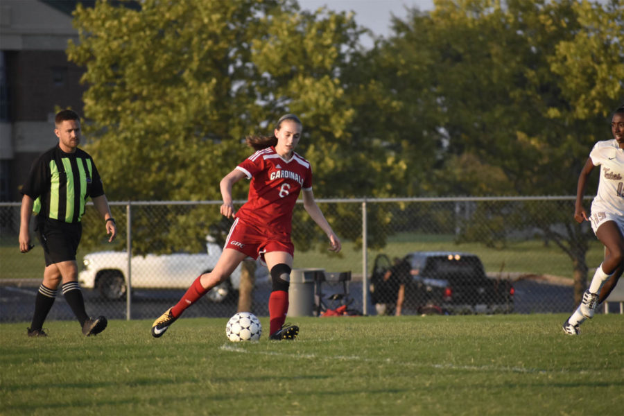 Julia Pohl, 10th, moves the ball upfield.