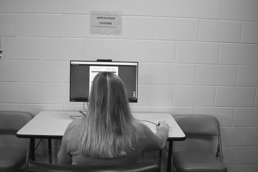 A student works at the Application Station in the Youth Service Center.