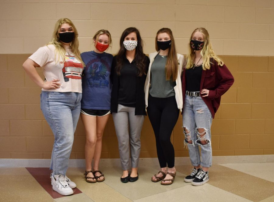 Cardinal Yearbook staff, from left, Lexi Garza, Ella Lucas, teacher Andi Rector, Haleigh Riddell and Delaney Peters