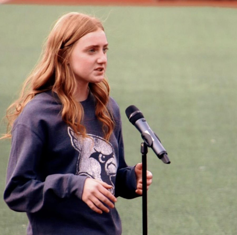 Mallory sings the national anthem at a GRC sporting event.