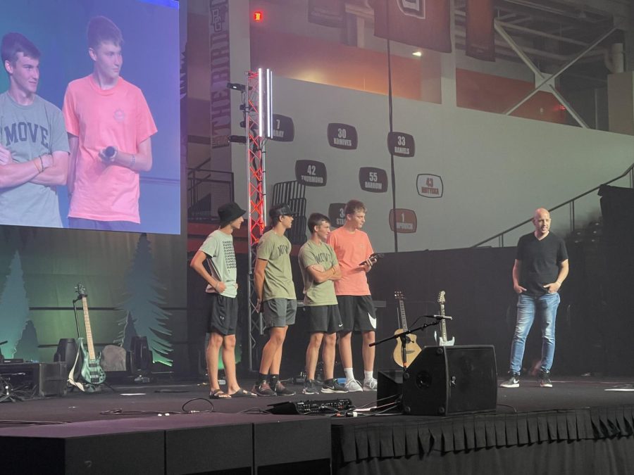 Joby Mitmesser, Eli Roach, Clay Turley and Ryan Jackson were recognized this summer in front of thousands of teens at a Christ in Youth conference. 