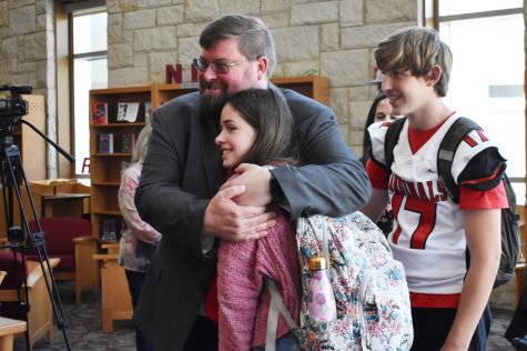 Dustin Howard celebrates with his children after being named new CCPS superintendent.