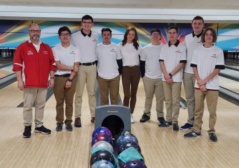 Coach Dodd Dixon and the GRC Bowling Team. Meredith Fryman, center, is headed to state.