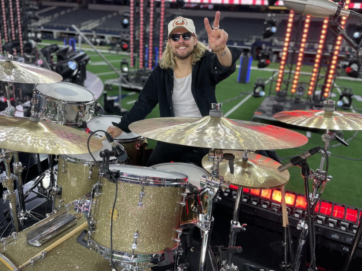 Caleb Crosby rehearses at Cowboys Stadium for the Thanksgiving halftime show with Dolly Parton.