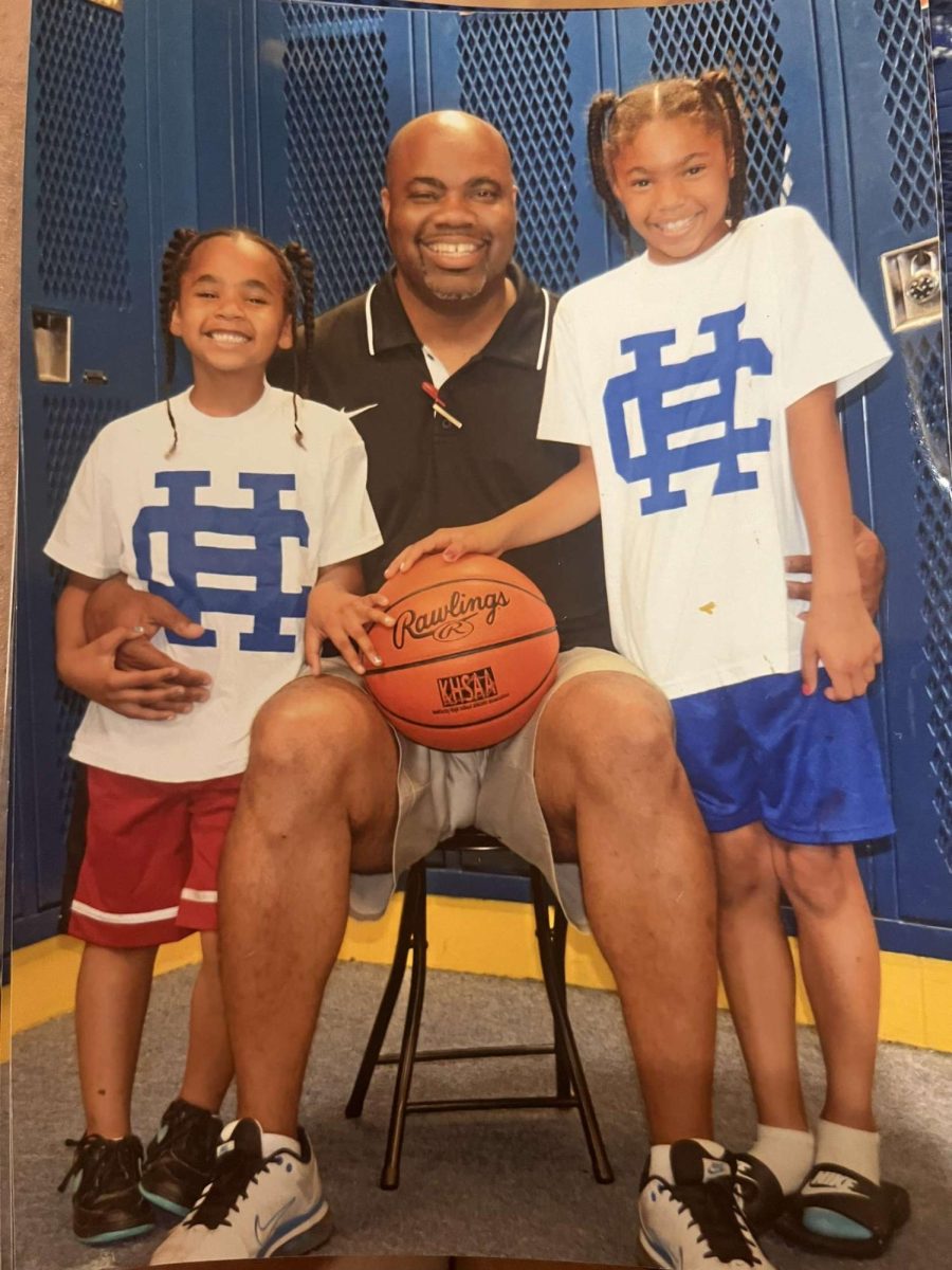 Ciara grew up in a basketball family. She is pictured here with her dad and sister, Bri.