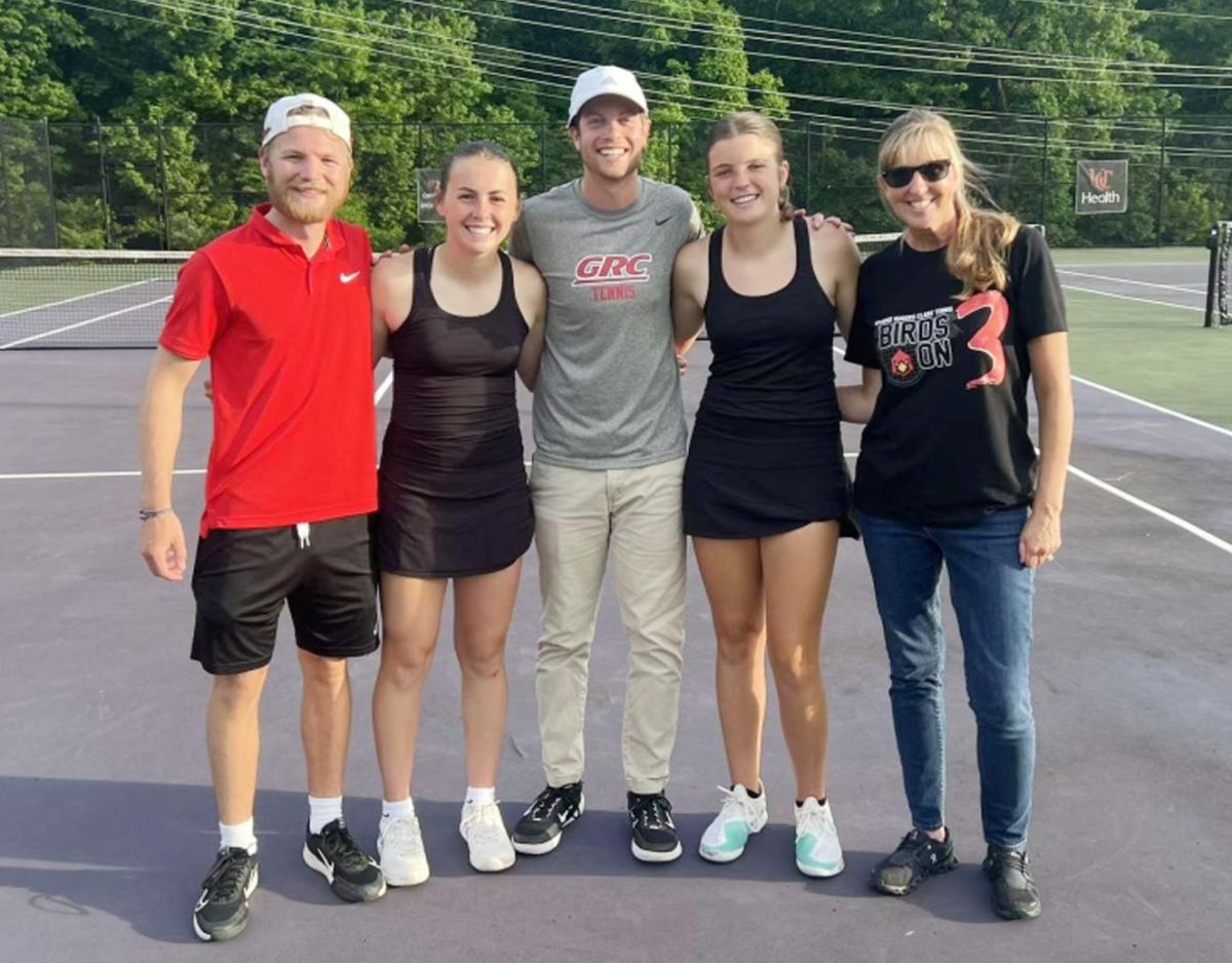 Madelyn Settles and Cassie Lowe won their third straight 10th Region doubles title. They are pictured with coaches Travis True, Head Coach Seth Heinss, and Rebecca Prater.