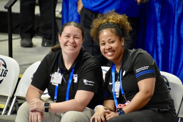 Head athletic trainer Caitlin Crump and new trainer Ariana Daniel at the Girls Basketball State Tournament.