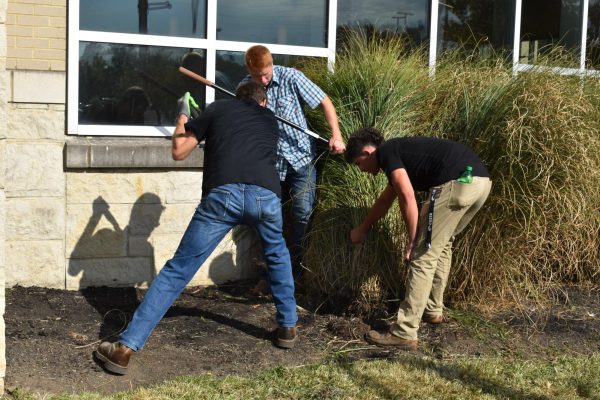 Students in Mr. Knights landscape class work in the front of GRC.