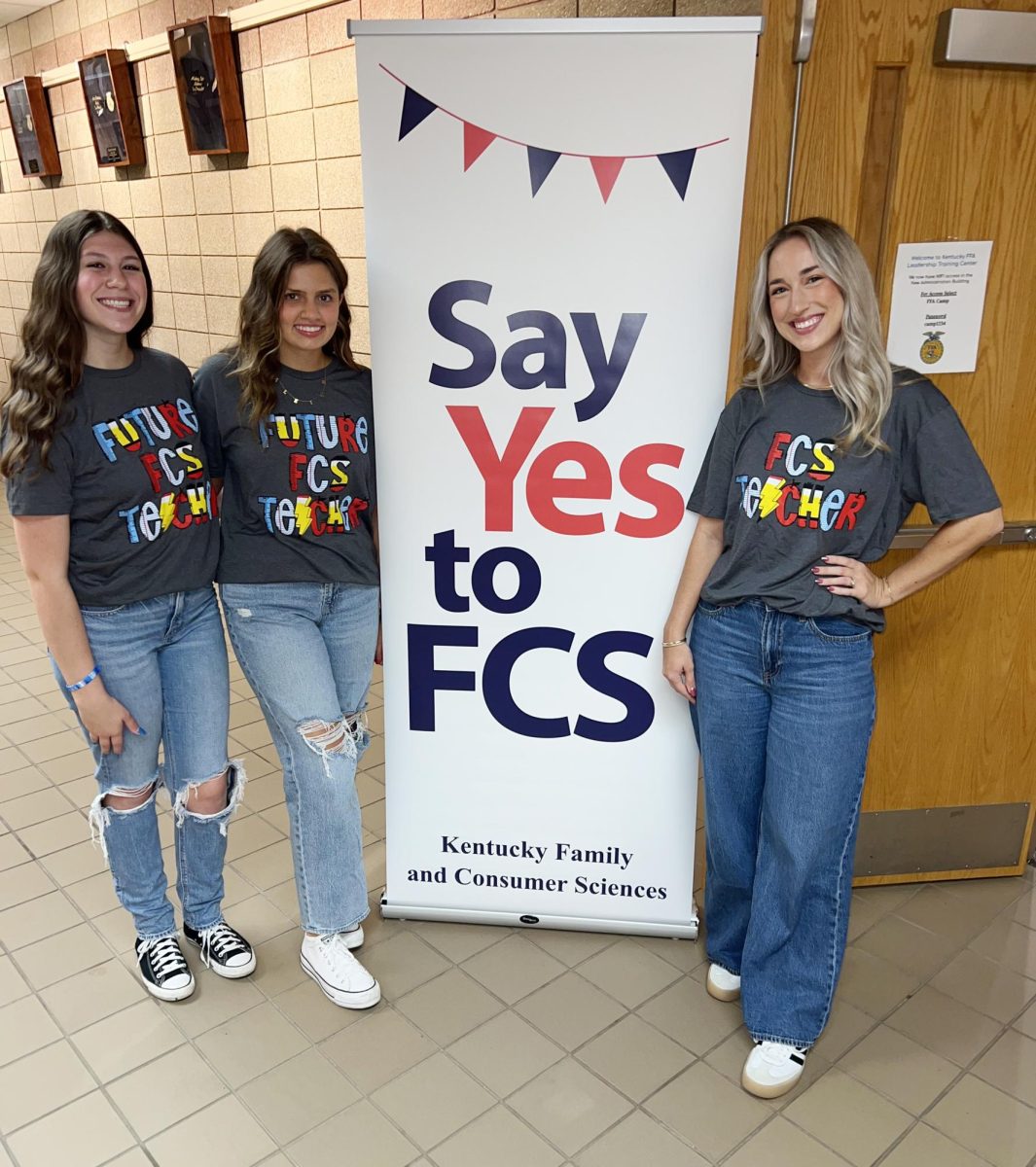 Seniors Cassandra Tuminski, Kaleigh Stamper, and teacher Olivia McArter at the Say Yes to FCS conference.