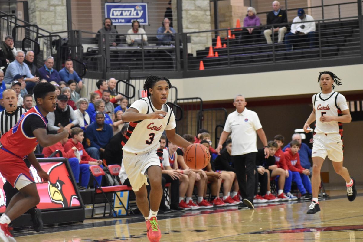 Malachi Ashford looks for an open teammate.