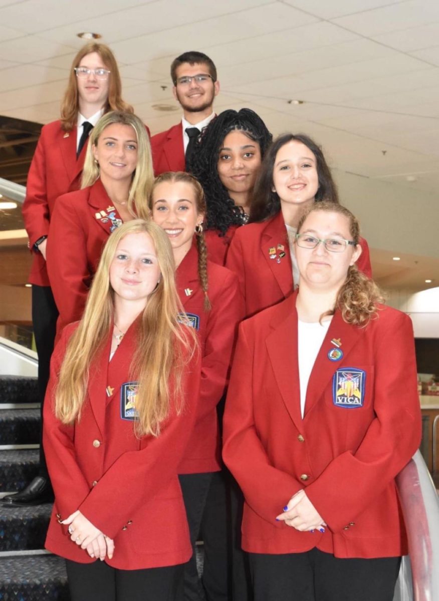 Lydia Chenault, front left, joins other officers in state SkillsUSA