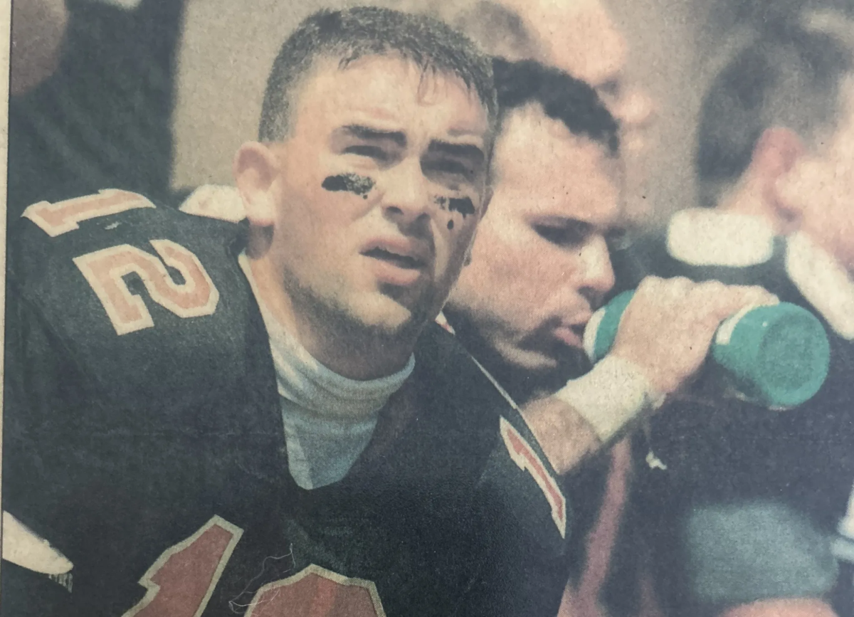 Damron playing football at Georgetown College